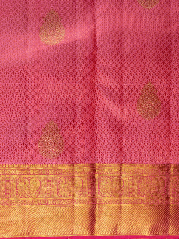 Coral pink pure Kanchipuram silk saree with gold zari buttas and contrast zari border
