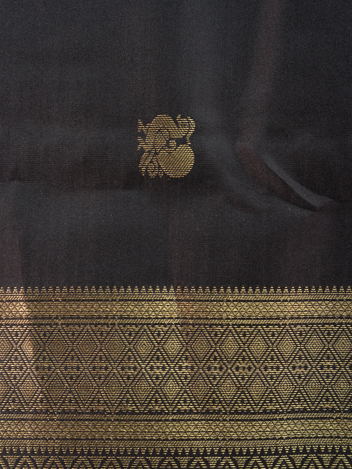 Black pure Kanchipuram silk saree with gold zari buttas and broad zari border