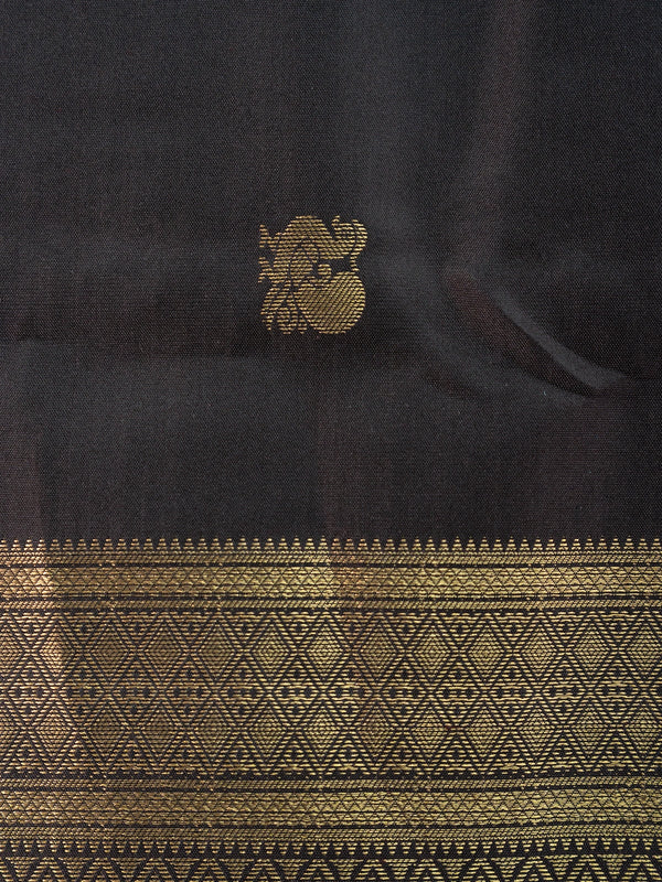 Black pure Kanchipuram silk saree with gold zari buttas and broad zari border