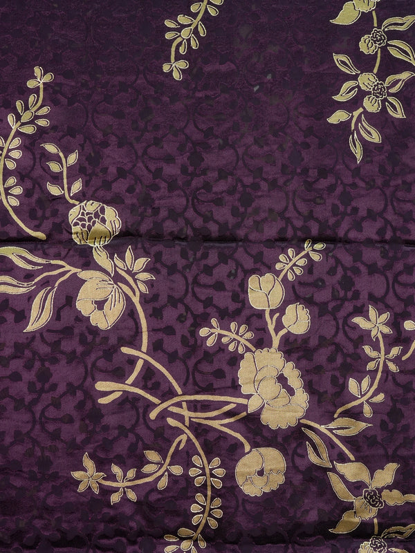 Purple and gold designer art silk saree with floral zari motifs, lotus pallu and contrast printed blouse