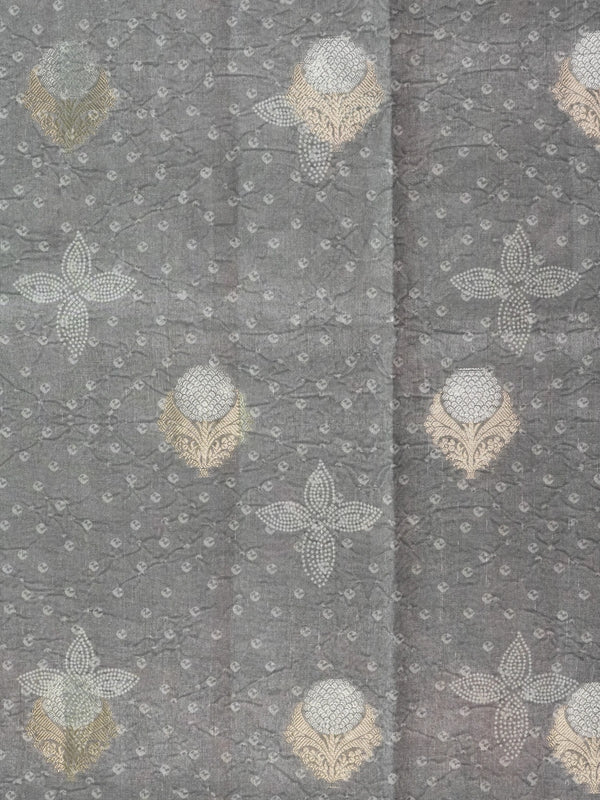 Grey designer saree with gold and silver woven floral buttas and a golden zari tissue border