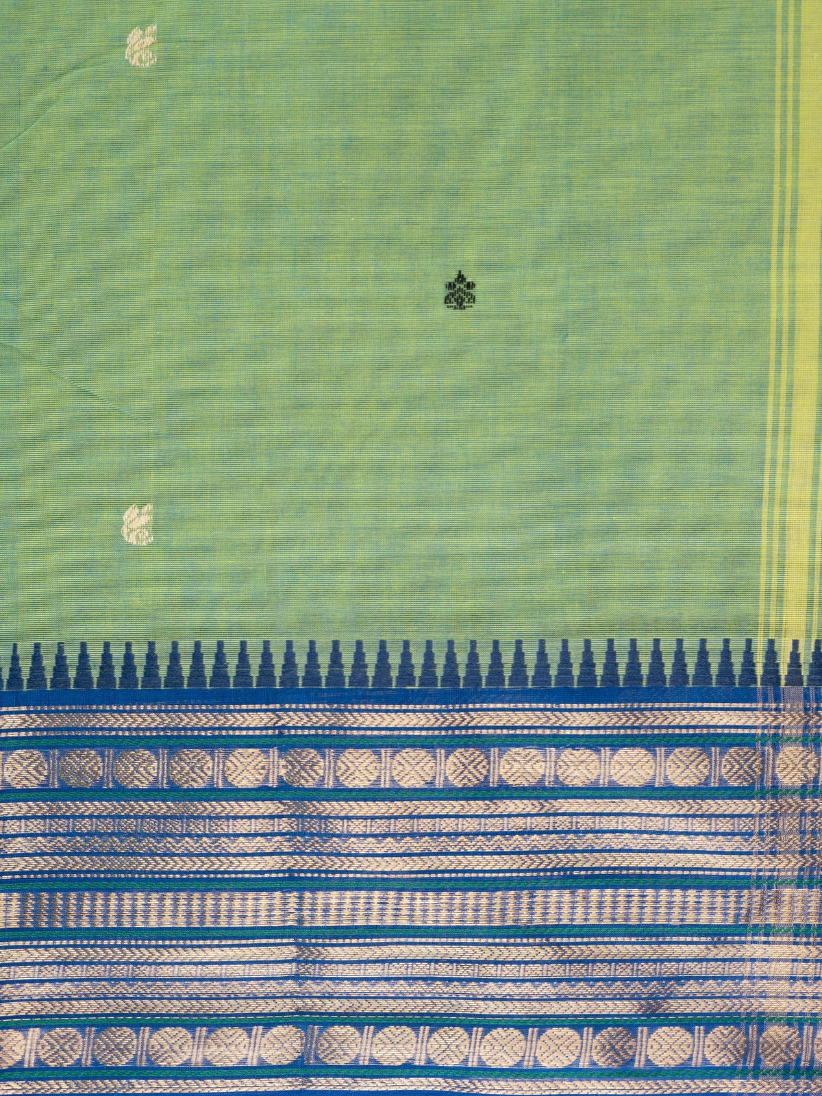 Green Chettinad cotton saree with contrast blue and gold zari temple border and scattered buttas