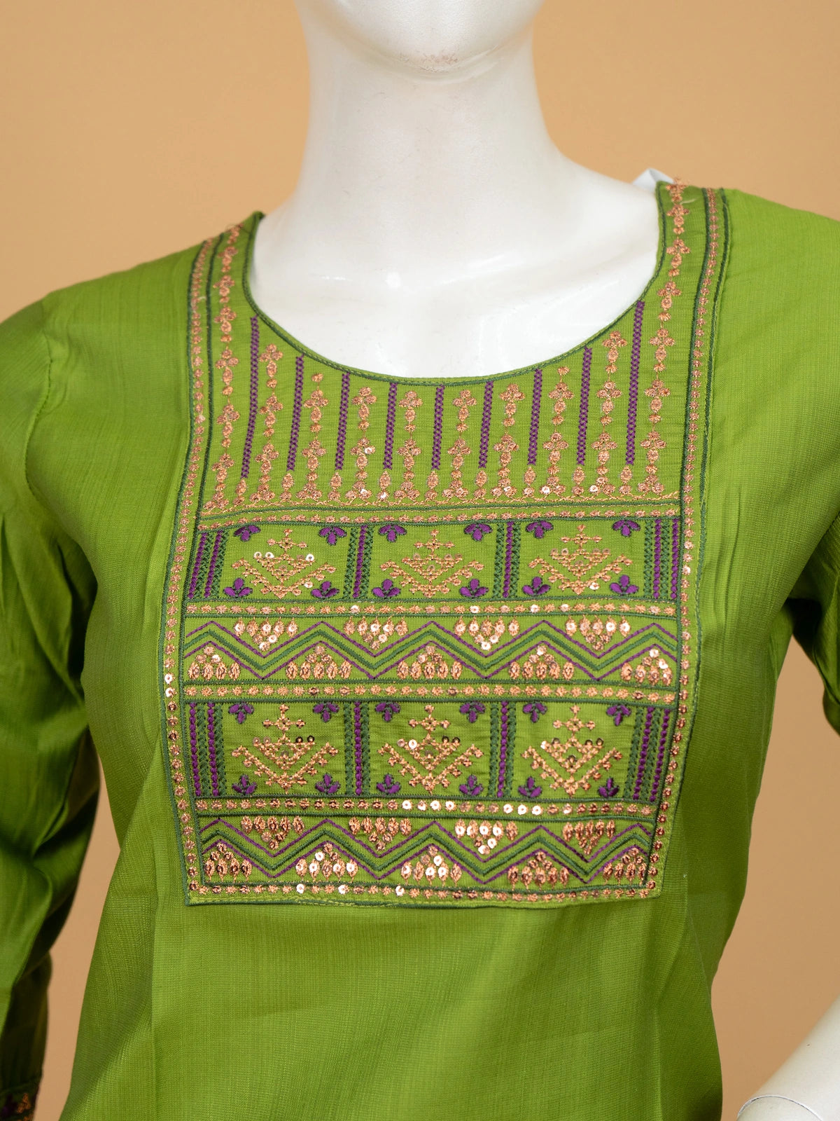 Green cotton silk straight cut kurti top with purple and gold embroidered yoke