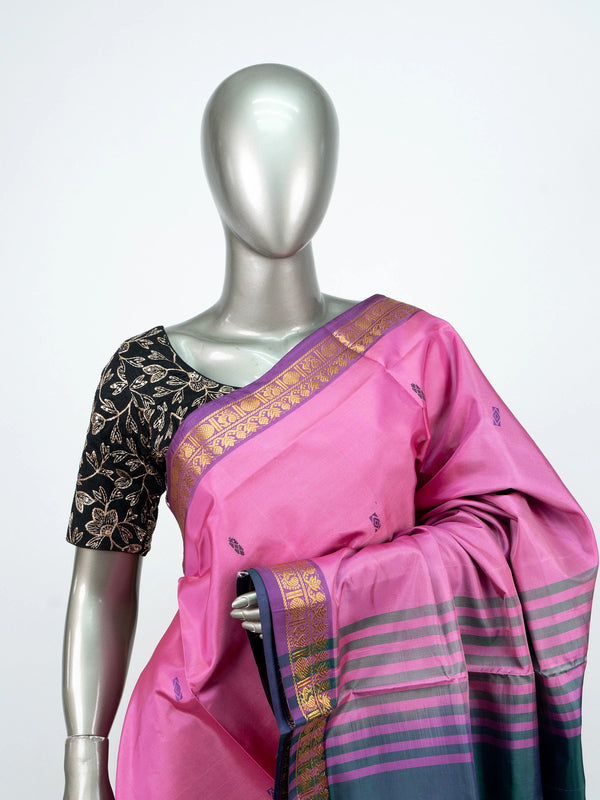 Pink and teal green Banana Silk saree with gold zari border and contrast striped pallu