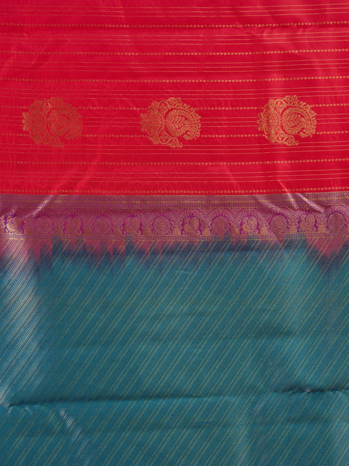 Red pure Kanchipuram silk saree with gold zari buttas and a contrast peacock-blue zari border