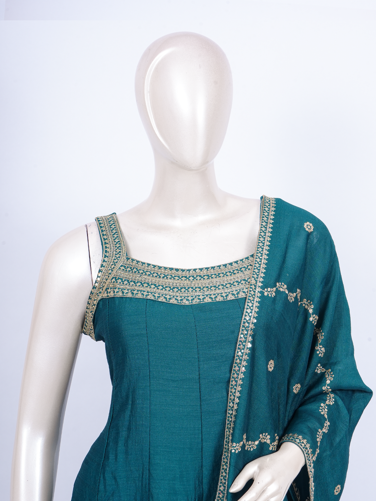 Teal embroidered art silk A-line kurti set with gold zari work and matching dupatta