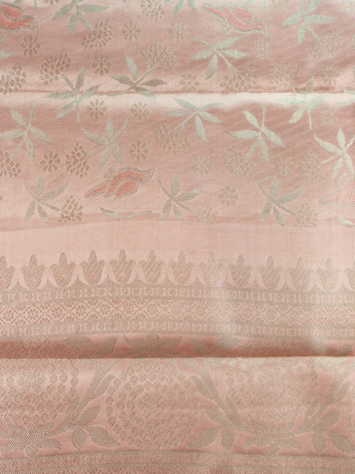 Rose pink pure Kanchipuram silk saree with silver zari floral and bird motifs and contrast zari border