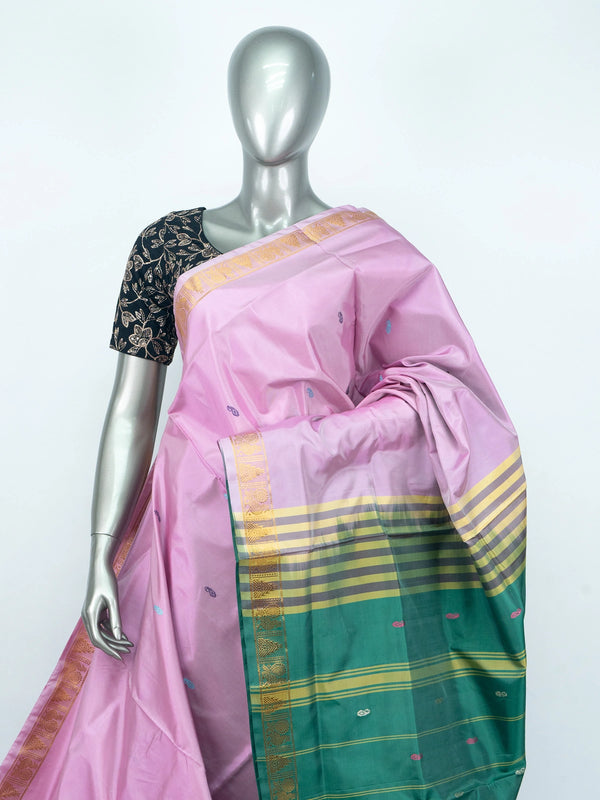 Pink and green Banana Silk saree with gold zari border, contrast pallu and black embroidered blouse