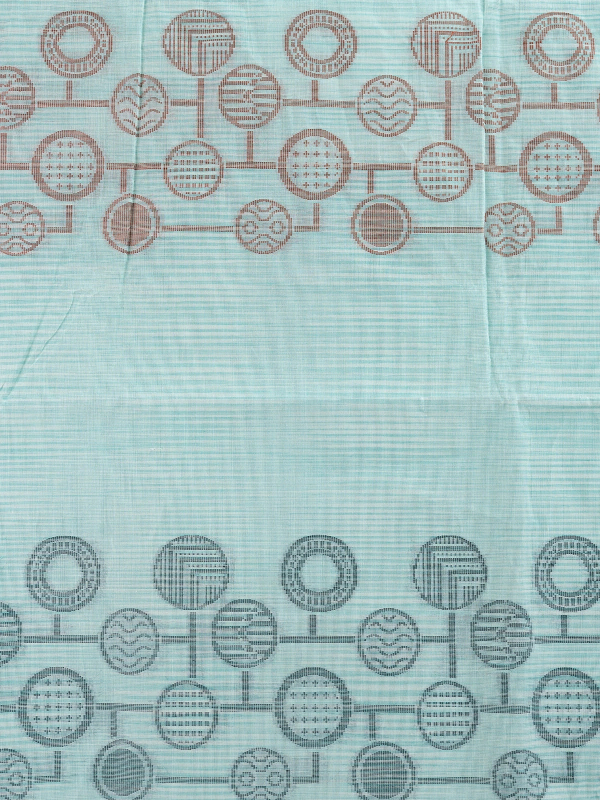 Aqua blue and grey silk cotton saree with circular motifs and copper zari border