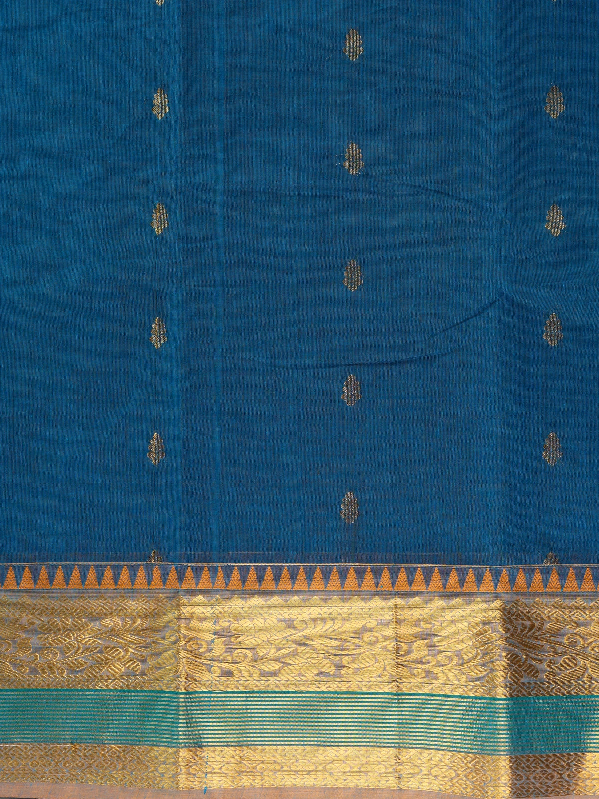 Peacock blue Chettinad cotton saree with gold zari buttas, temple zari border and contrast mustard-gold pallu