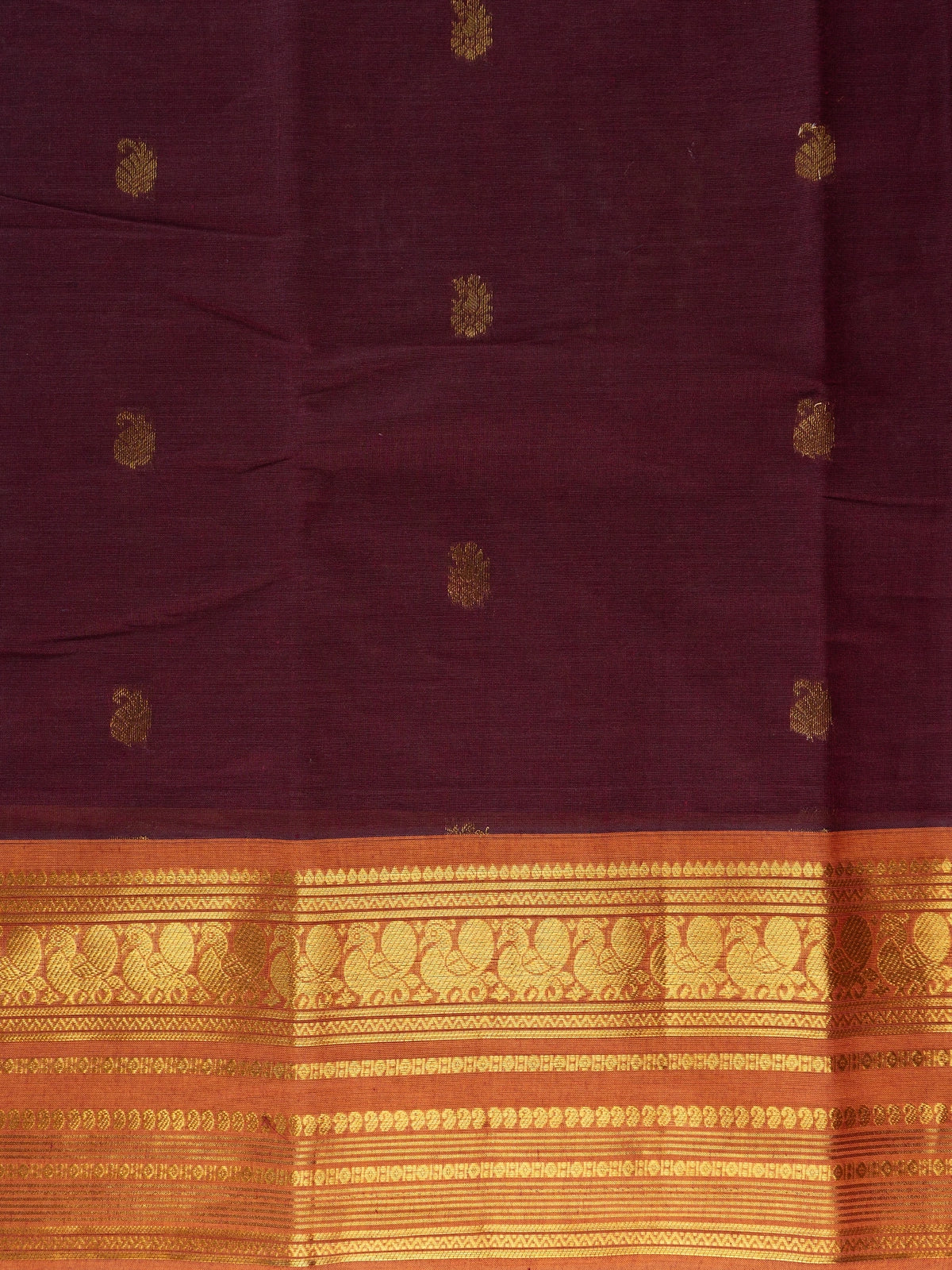 Maroon Chettinad cotton saree with contrast orange gold zari peacock border and zari buttas