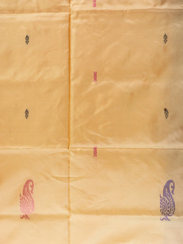 Golden yellow banana silk saree with plum contrast pallu, zari stripes and paisley buttas