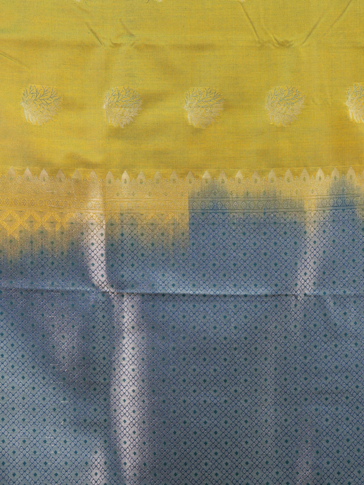 Olive green semi silk saree with teal blue contrast zari border and zari butta motifs