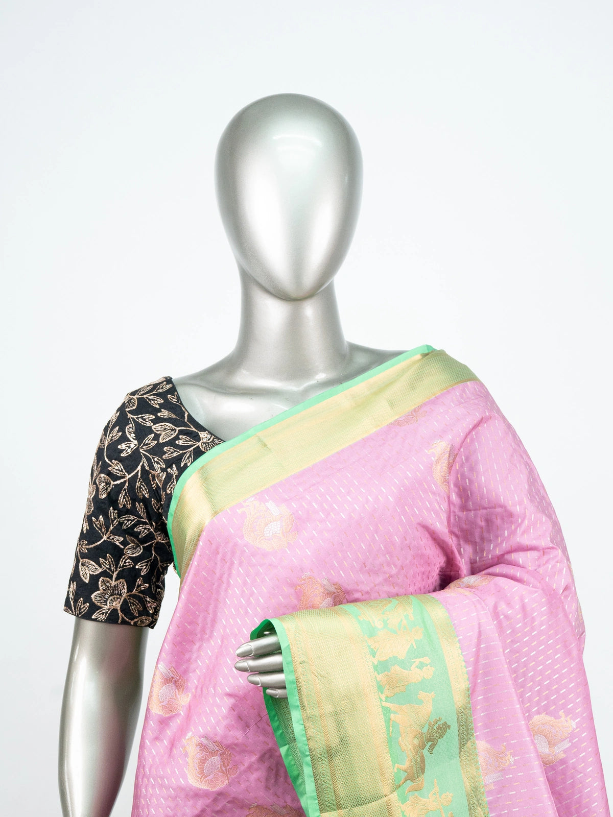 Pink soft silk saree with contrast green and gold zari border and floral zari pallu