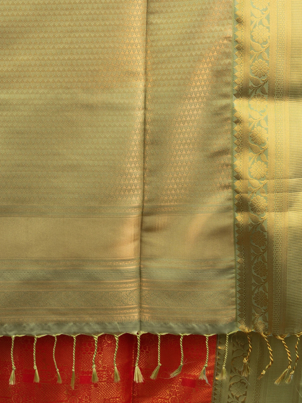 Orange Kanchipuram Fancy Silk saree with contrast green and gold zari border and pallu