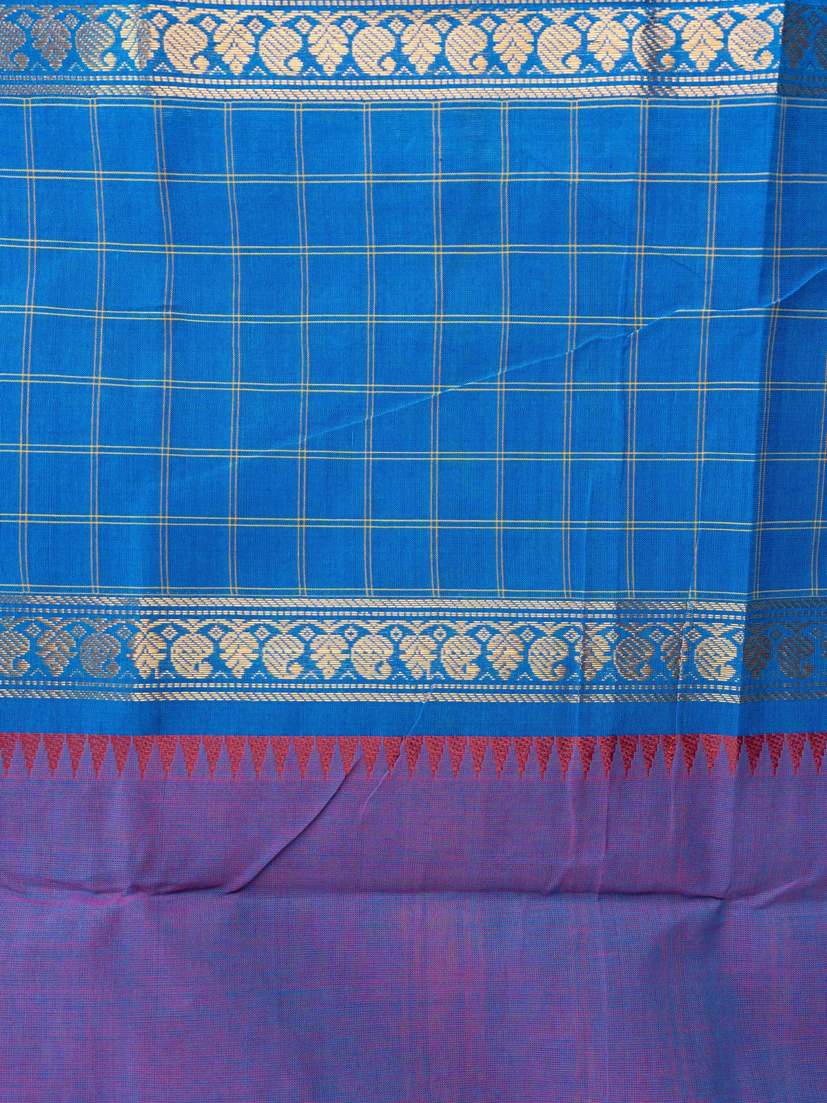 Royal blue Chettinad cotton saree with checked body, floral buttas and contrast purple striped pallu