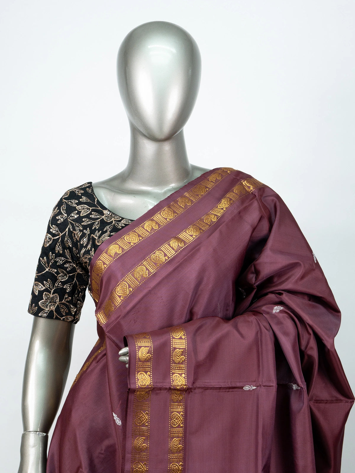 Wine maroon banana silk saree with gold zari border, silver buttas and contrast black blouse