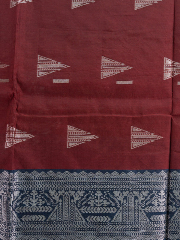 Maroon silk cotton saree with silver zari triangular motifs and contrast navy blue zari border and pallu
