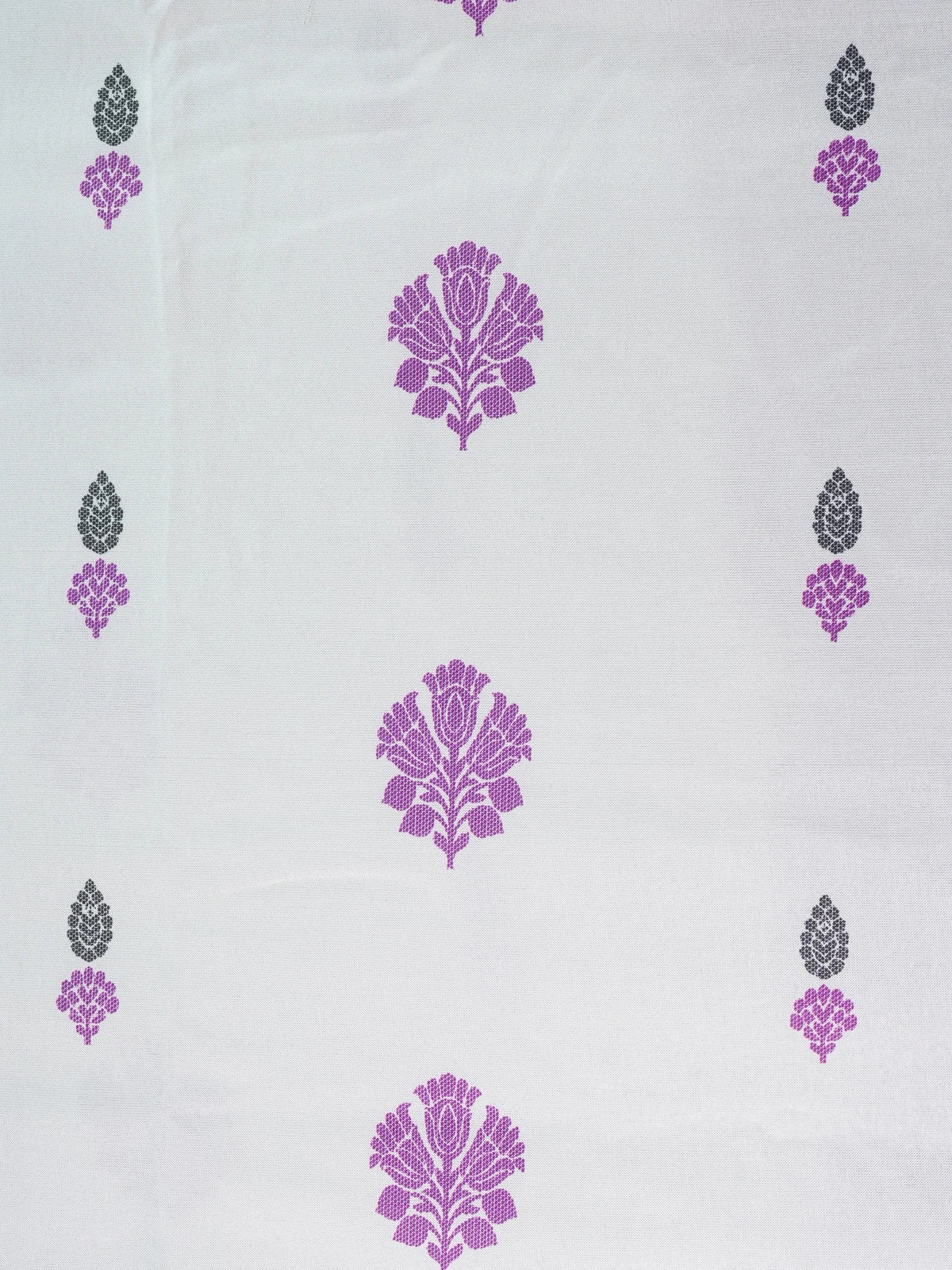 Cream Dola silk saree with purple floral buttas, gold zari contrast border and patterned purple pallu