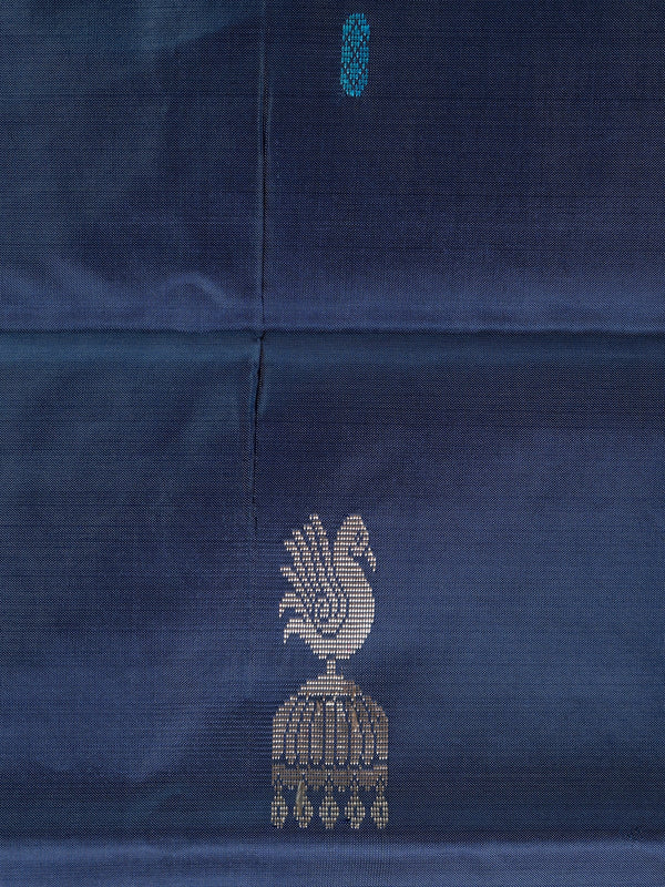 Navy blue banana silk saree with contrast peach pallu, peacock motifs and gold zari border