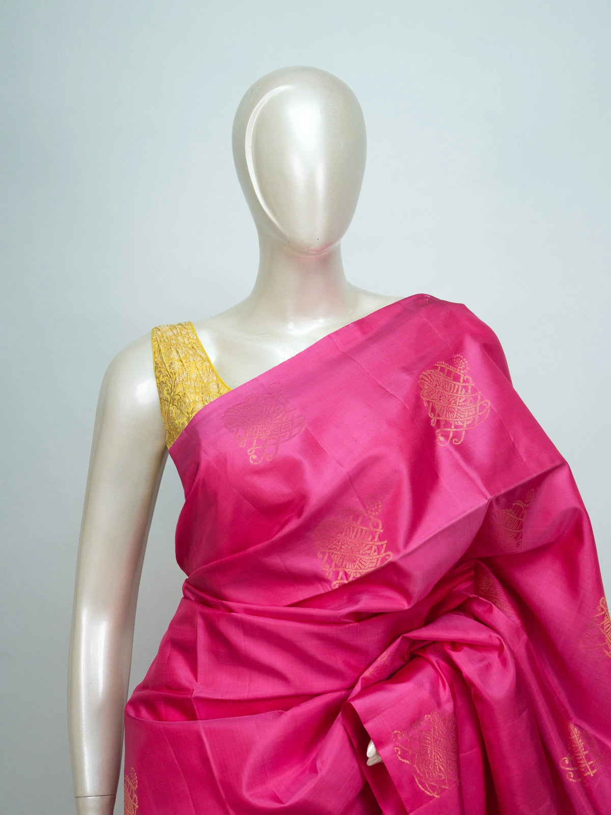 Pink pure soft silk saree with contrast lime-green zari border, pallu and gold zari buttas