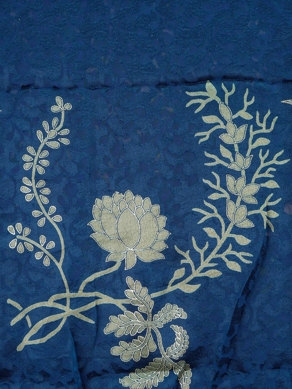 Navy blue and gold designer saree with floral lotus motifs and geometric border