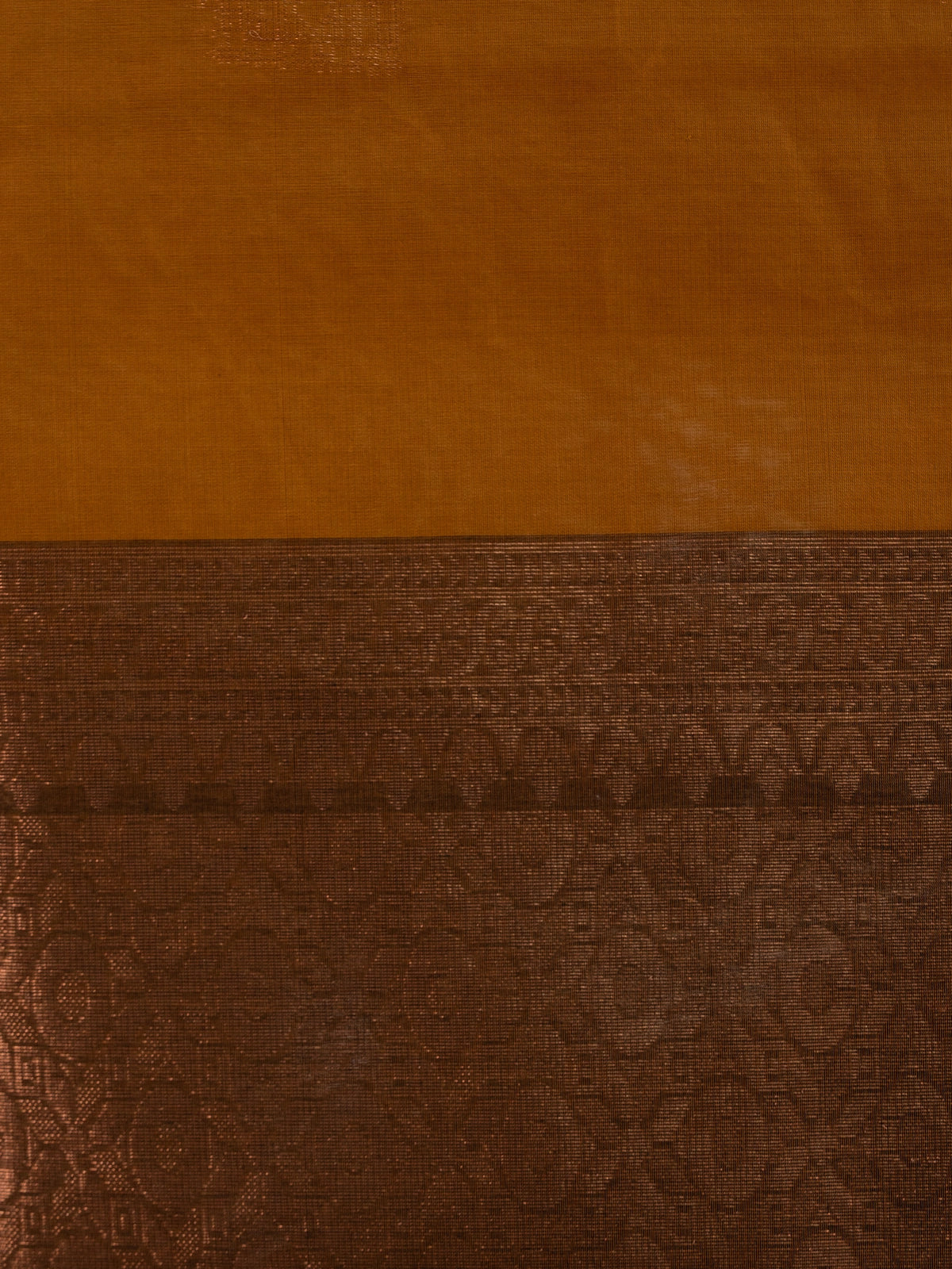 Mustard silk cotton saree with contrast dark brown copper zari border and woven buttas