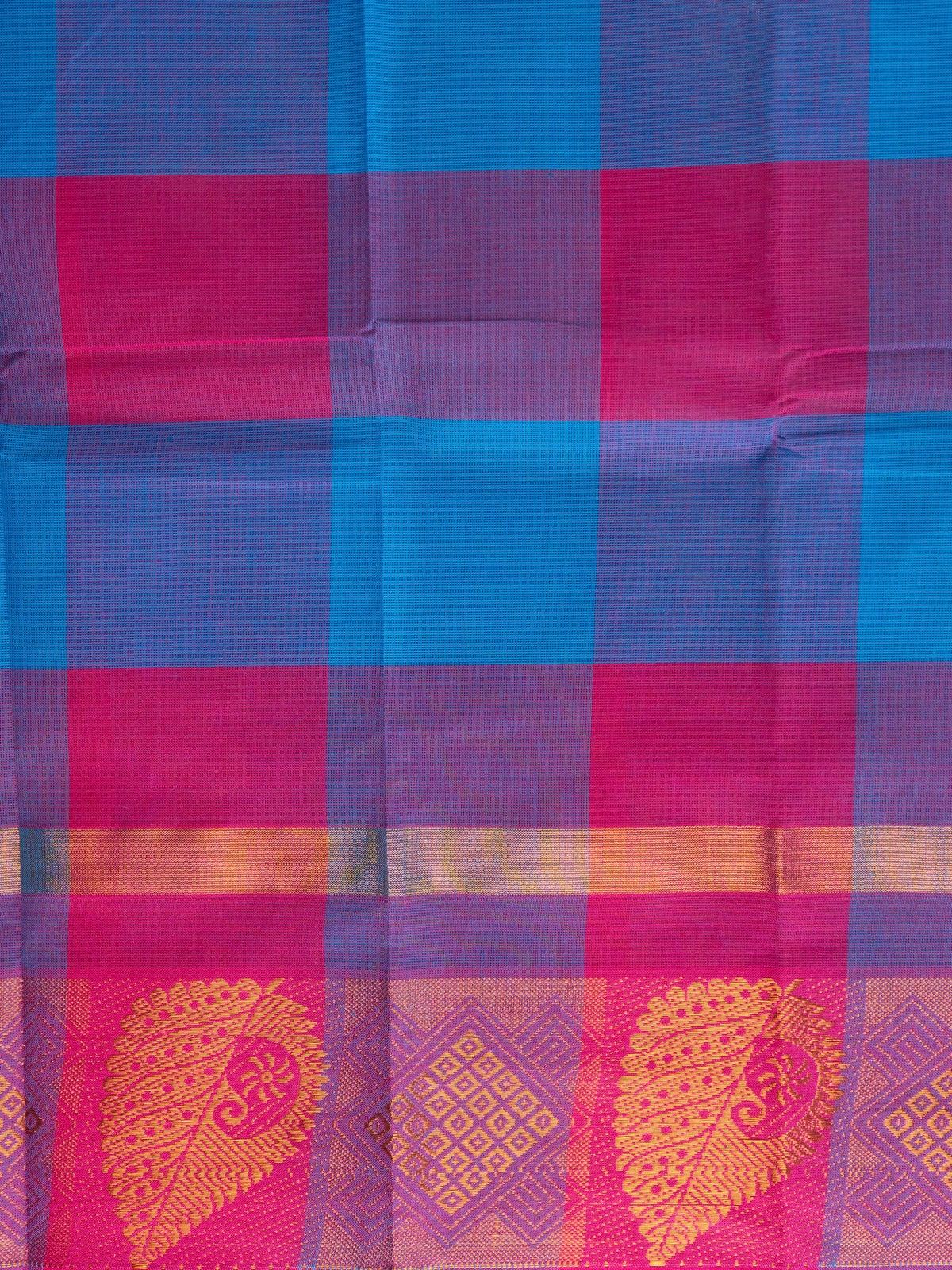 Pink and blue checked Chettinad cotton saree with gold zari border and paisley motif pallu