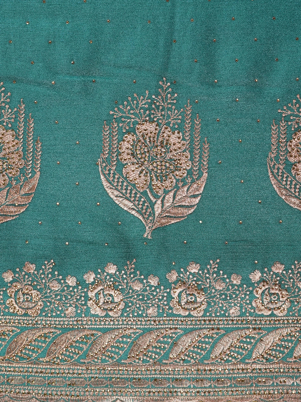 Teal green designer saree with copper floral embroidery, sequin work and scalloped embroidered border
