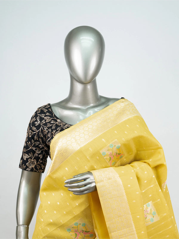 Bright yellow linen cotton saree with gold zari border, buti dots and pastel bird-floral motifs