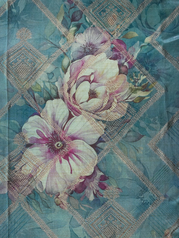 Teal blue semi tussar saree with floral print, diamond zari grid and contrast geometric border