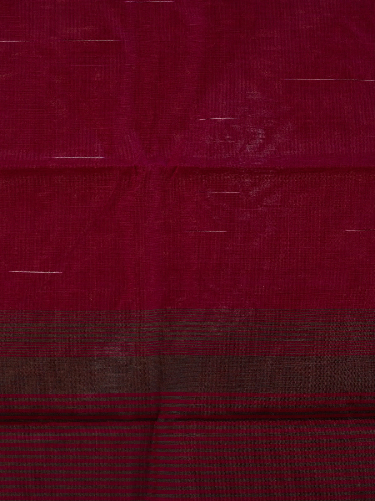 Deep magenta silk cotton saree with fine zari stripes and a dark contrast striped pallu