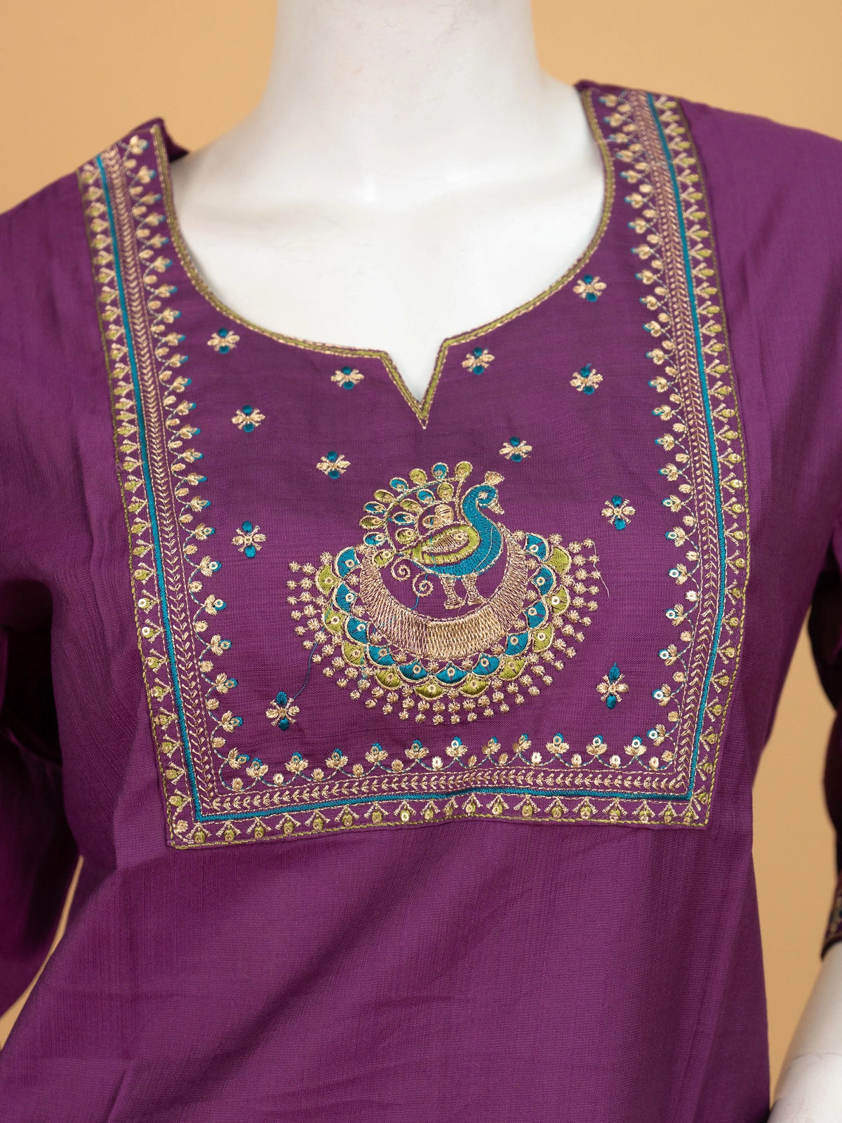 Purple peacock embroidered Anarkali kurti top with gold and teal zari yoke work