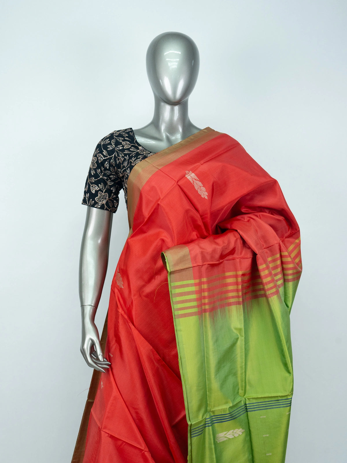 Red Banana silk saree with lime green contrast pallu, gold-copper zari border and woven buttas