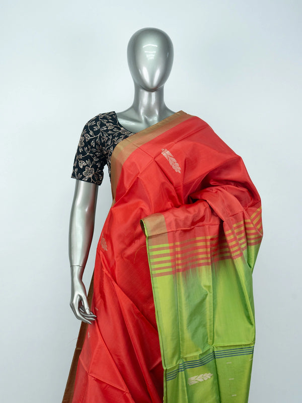 Red Banana silk saree with lime green contrast pallu, gold-copper zari border and woven buttas