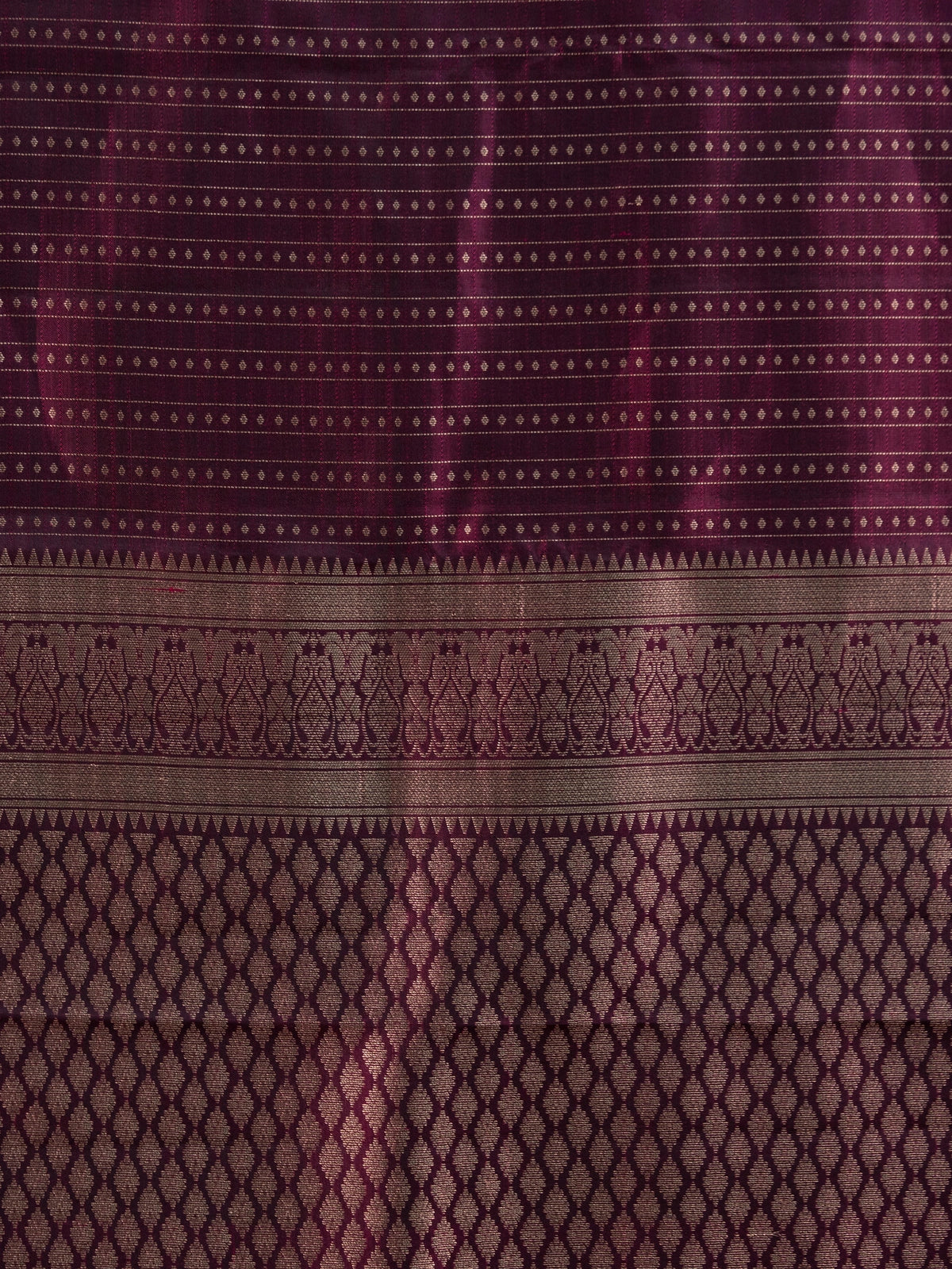 Wine purple pure Kanchipuram silk saree with gold zari striped body, contrast border and diamond jaali pallu
