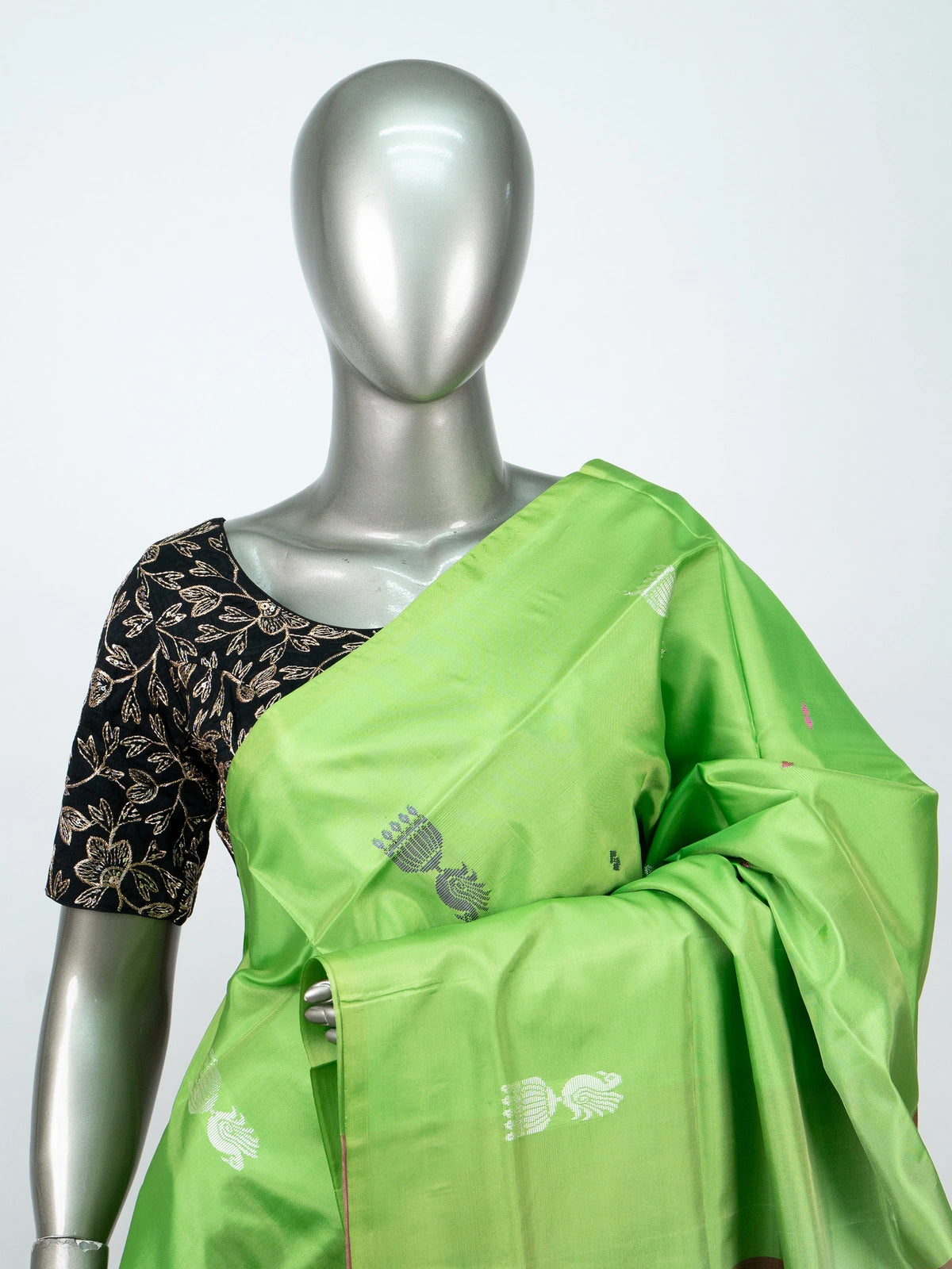 Parrot green Banana silk saree with contrast rose pink pallu and woven buttas