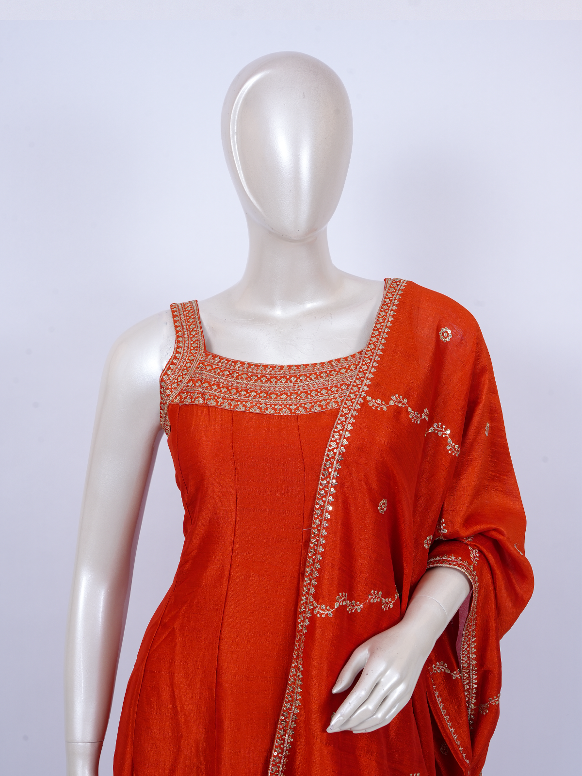 Orange embroidered art silk sleeveless kurti set with matching dupatta and straight pants