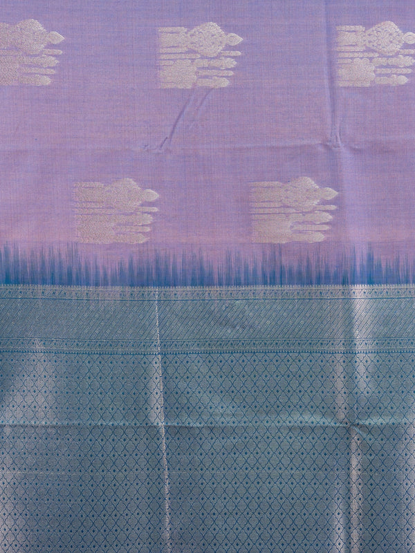 Lavender semi silk saree with teal blue contrast border and silver zari buttas
