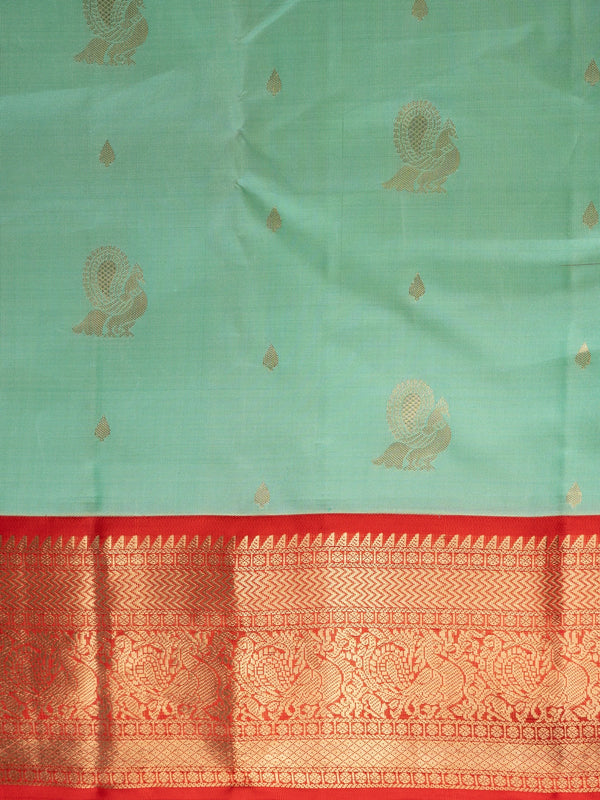 Sea green pure Kanchipuram silk saree with contrast red border, gold zari peacock motifs and richly woven pallu