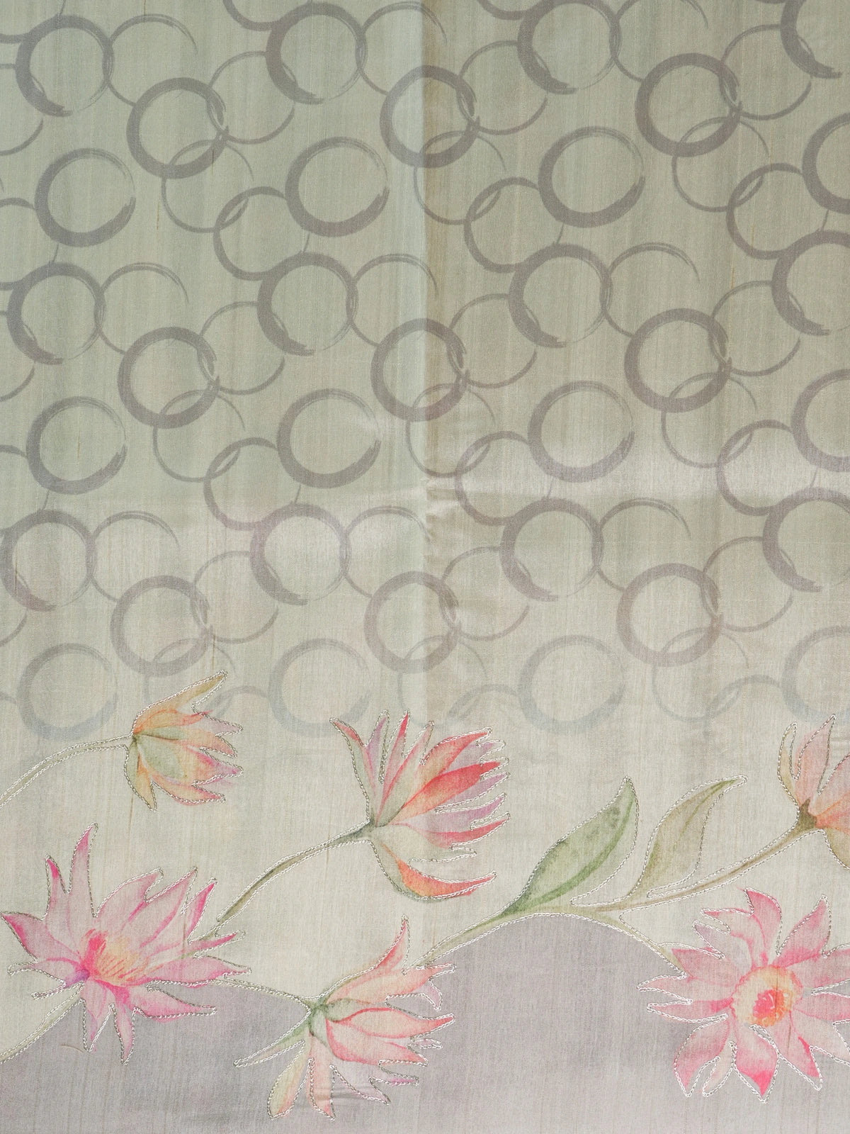 Cream and grey art silk designer saree with hand-painted lotus florals, silver outlining and a contrast grey border