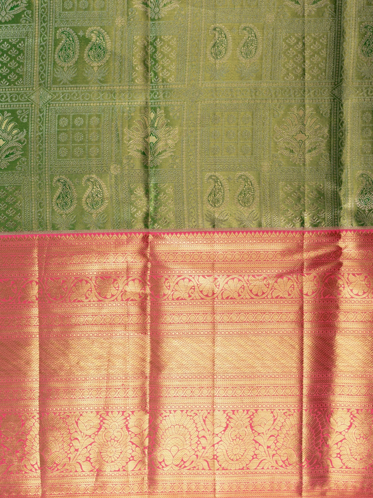 Green pure Kanchipuram silk saree with contrast pink border and gold zari brocade body and pallu
