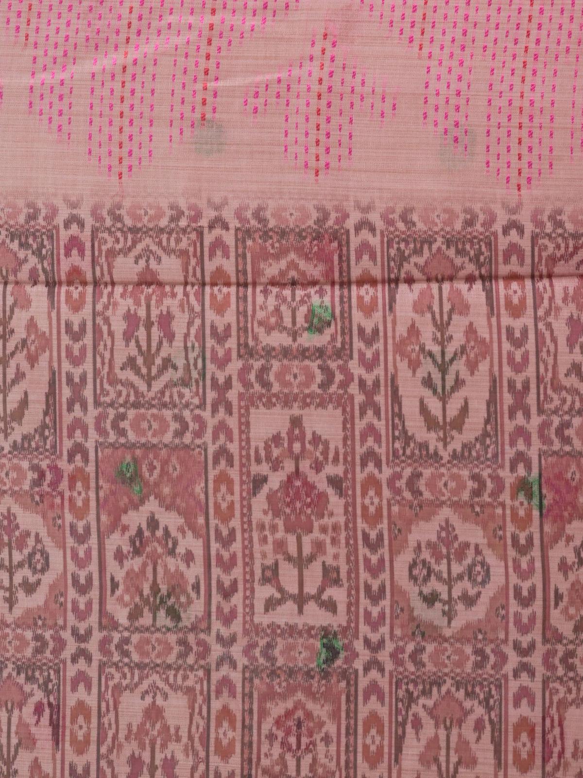 Dusty pink linen cotton saree with ikat patola body and Madhubani bird pallu