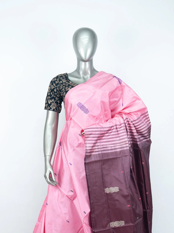 Pink banana silk saree with contrast maroon pallu, woven buti motifs, and black floral blouse