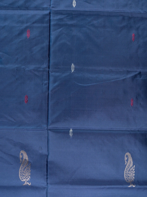 Navy blue banana silk saree with mustard contrast pallu and silver zari peacock buttas