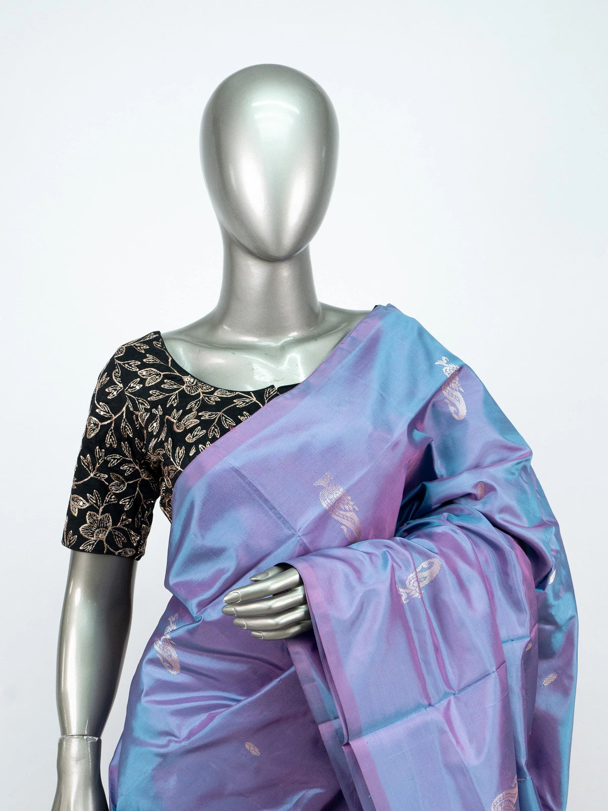 Blue and rani pink banana silk saree with gold zari paisley motifs and contrast pallu