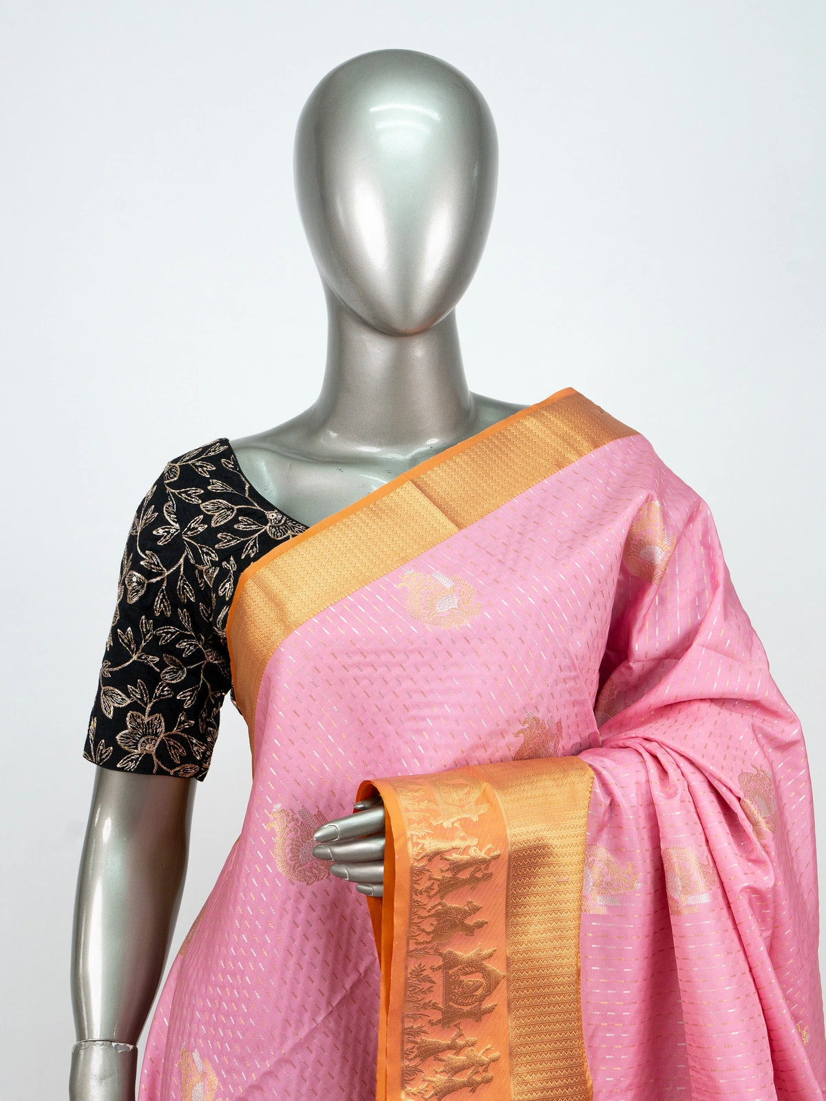 Pink soft silk saree with gold zari buti body and contrast orange zari border and pallu