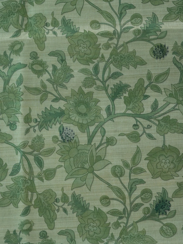 Sage green floral printed linen cotton saree with grey dotted border and tree-motif pallu