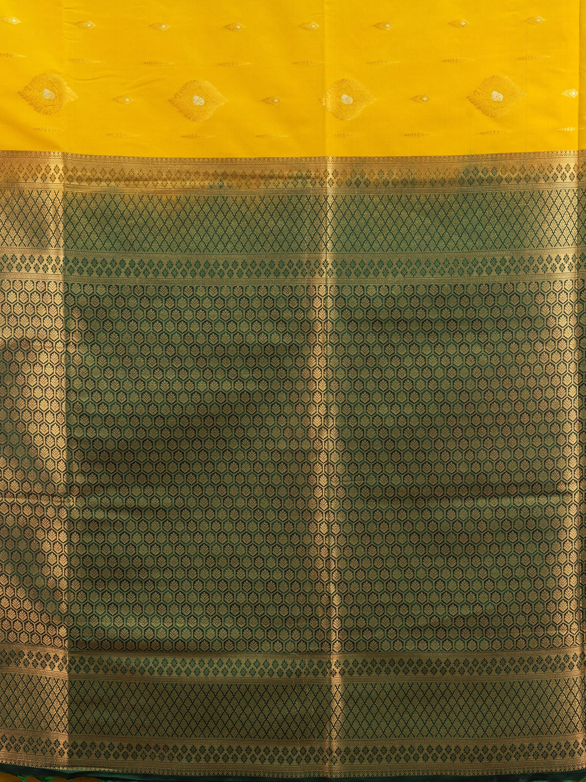 Mustard yellow Kanchipuram fancy silk saree with green contrast zari border and pallu