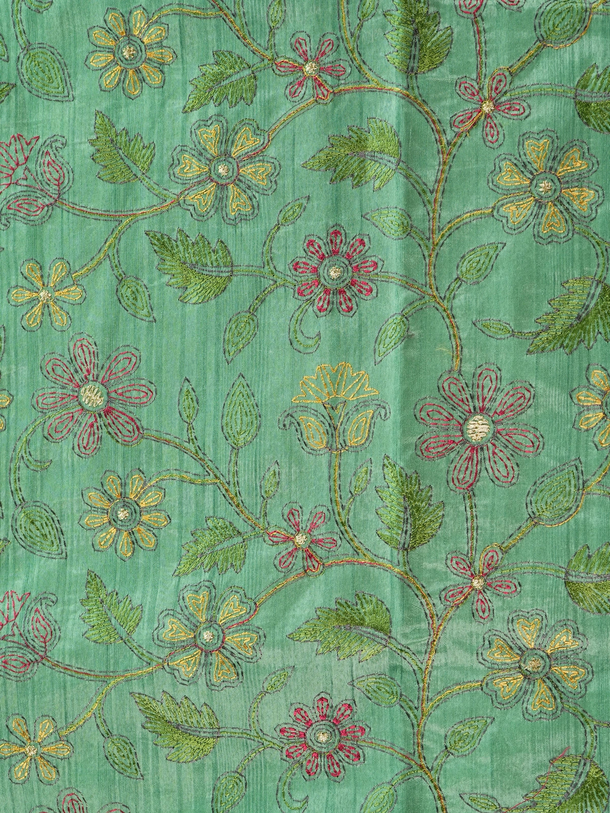 Green semi tussar saree with multicolour floral thread embroidery and gold zari accents
